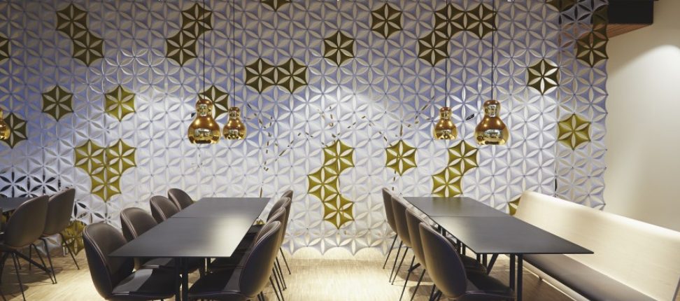 Restaurant interior with patterned acoustic wall